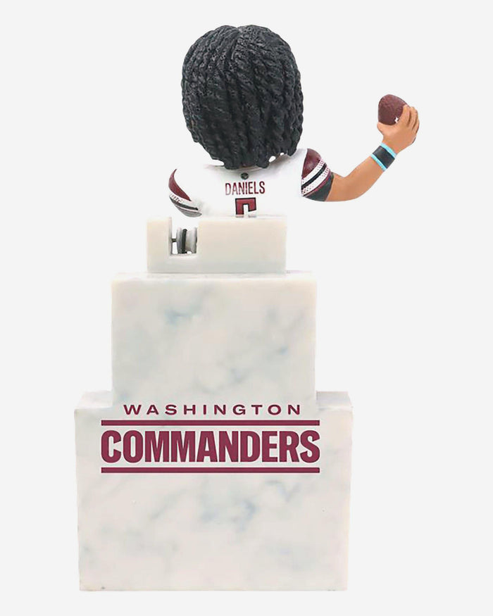 Jayden Daniels Washington Commanders Raise Hail Banner Raising Bobblehead FOCO - FOCO.com