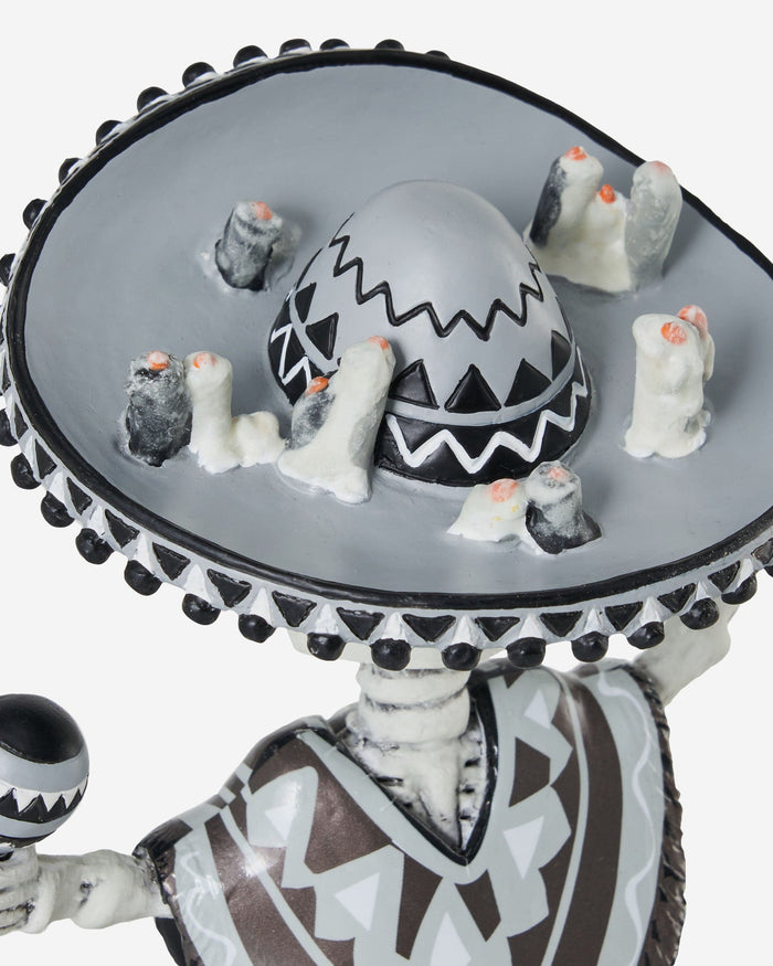 Las Vegas Raiders Calavera Glow in the Dark Bobblehead FOCO - FOCO.com