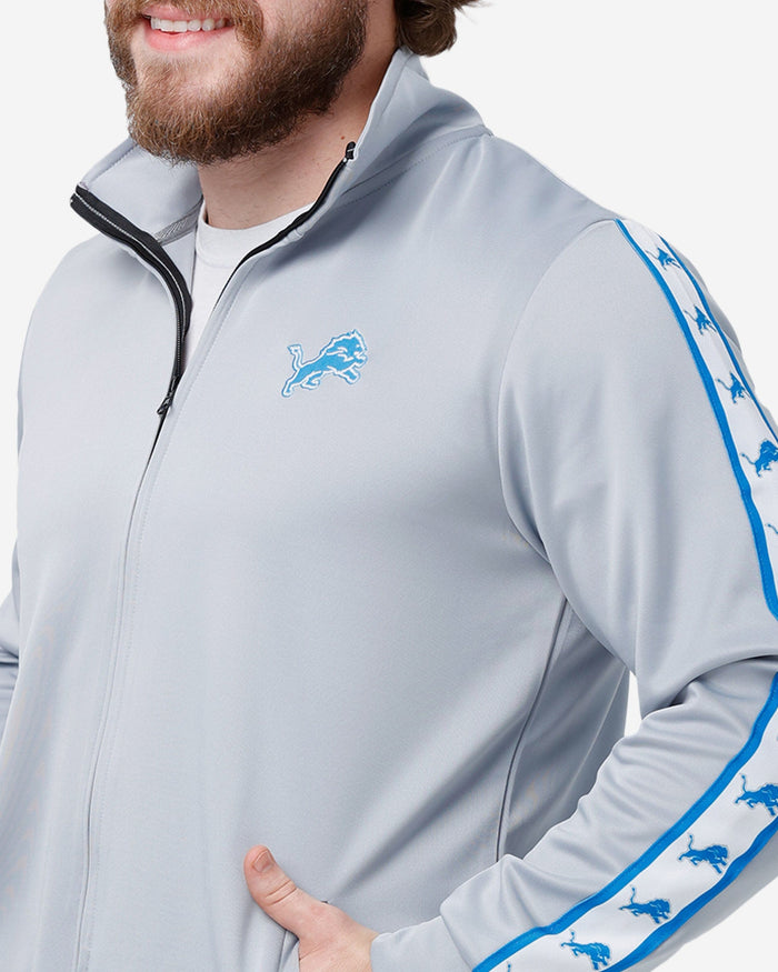 Detroit Lions Stripe Logo Track Jacket FOCO - FOCO.com