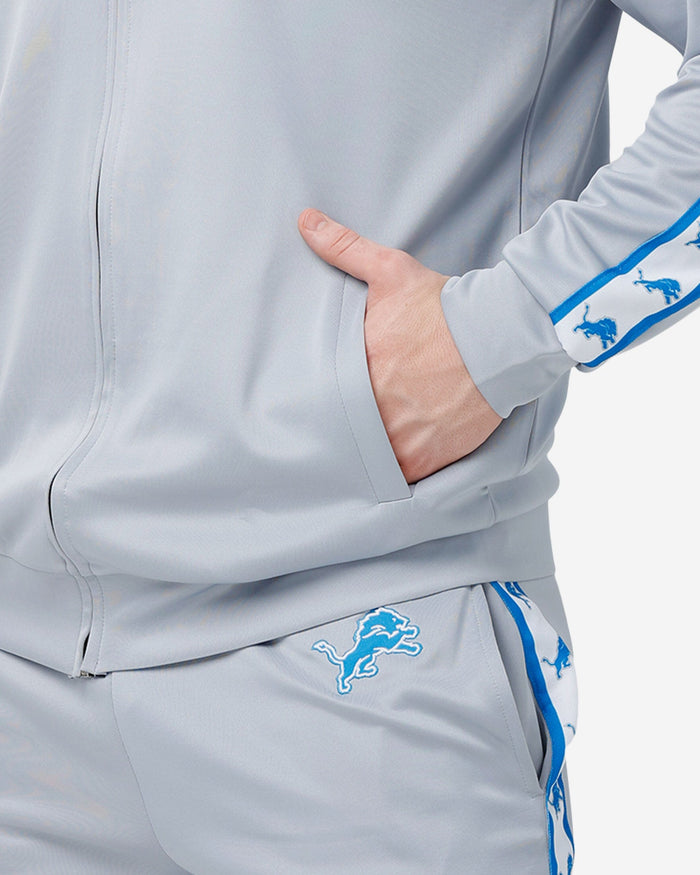 Detroit Lions Stripe Logo Track Jacket FOCO - FOCO.com