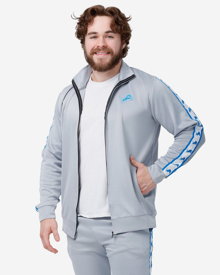 Detroit Lions Stripe Logo Track Jacket FOCO - FOCO.com