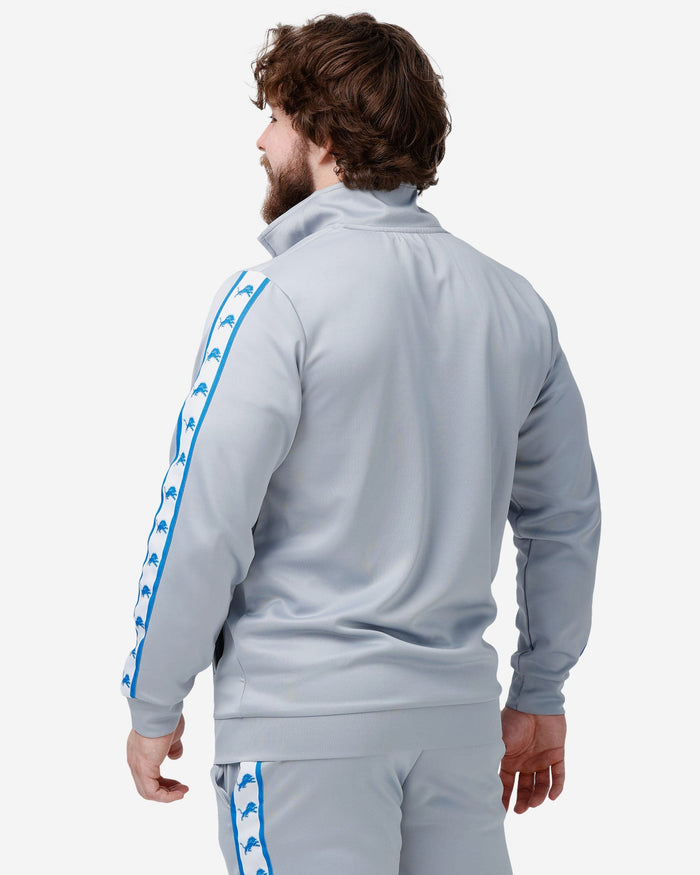 Detroit Lions Stripe Logo Track Jacket FOCO - FOCO.com