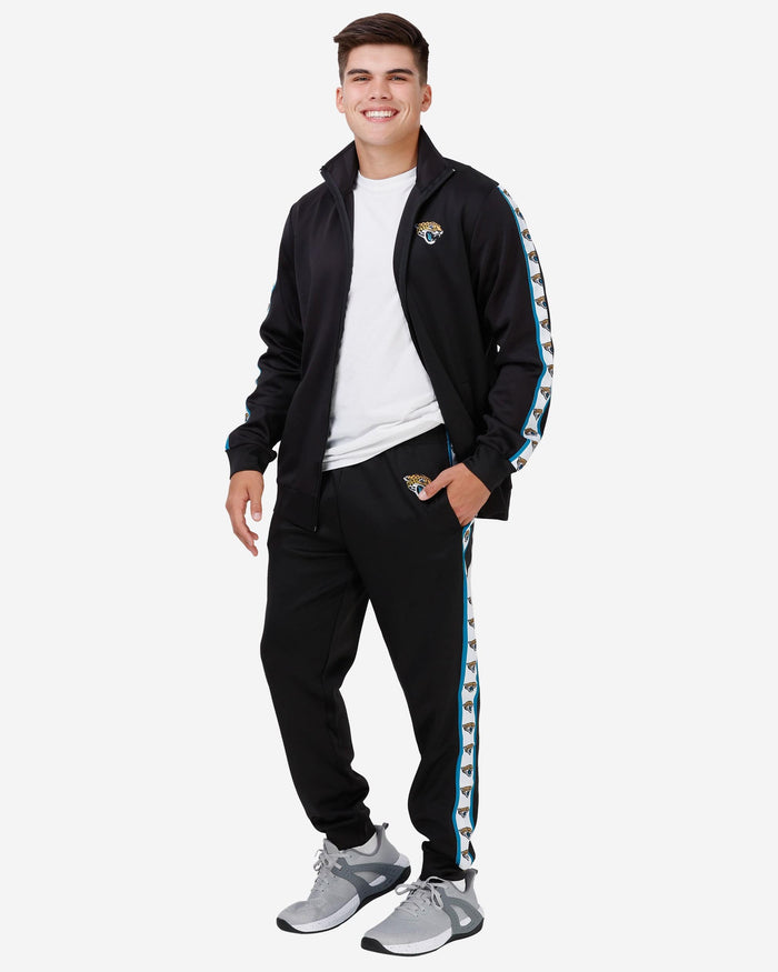 Jacksonville Jaguars Stripe Logo Track Pants FOCO - FOCO.com