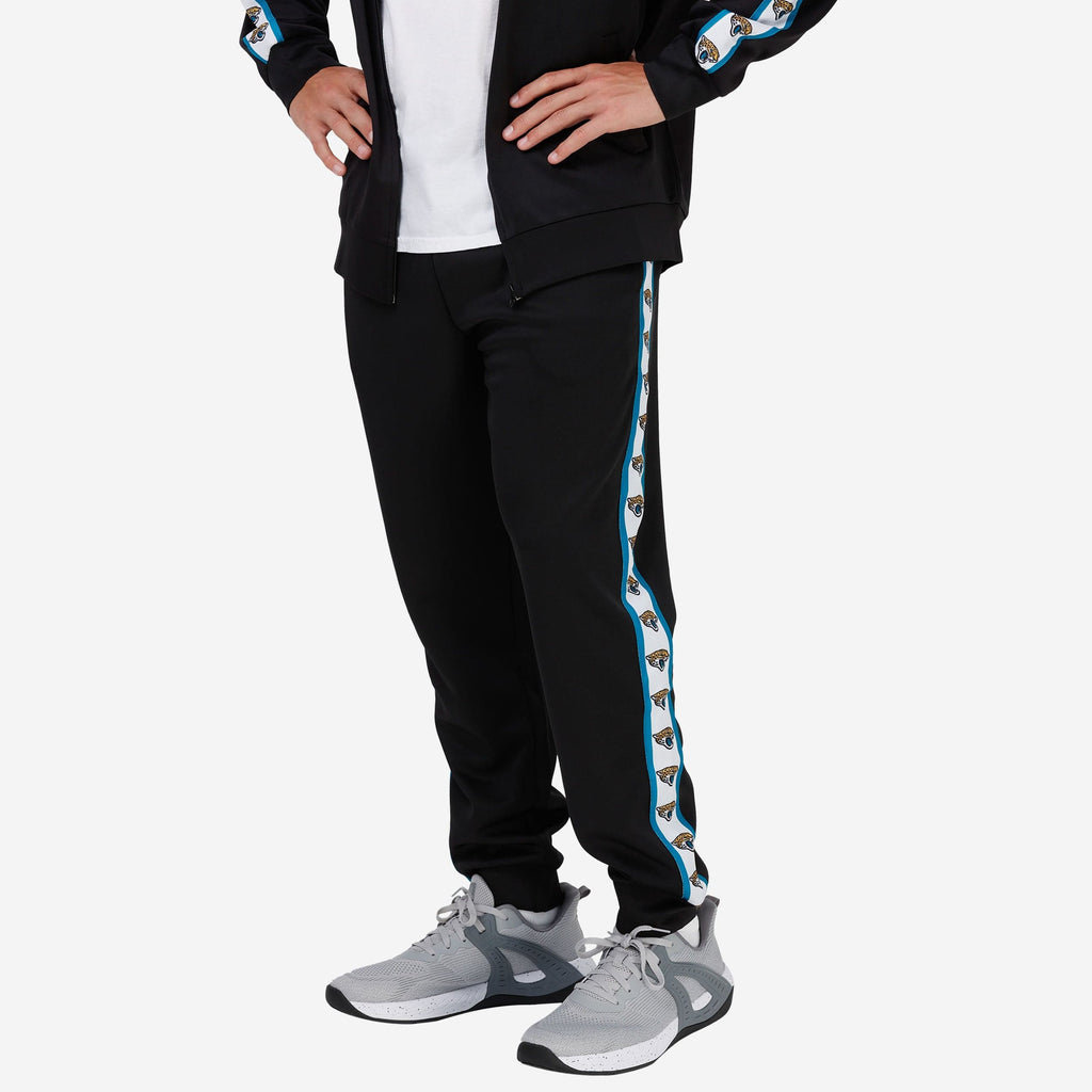 Jacksonville Jaguars Stripe Logo Track Pants FOCO S - FOCO.com