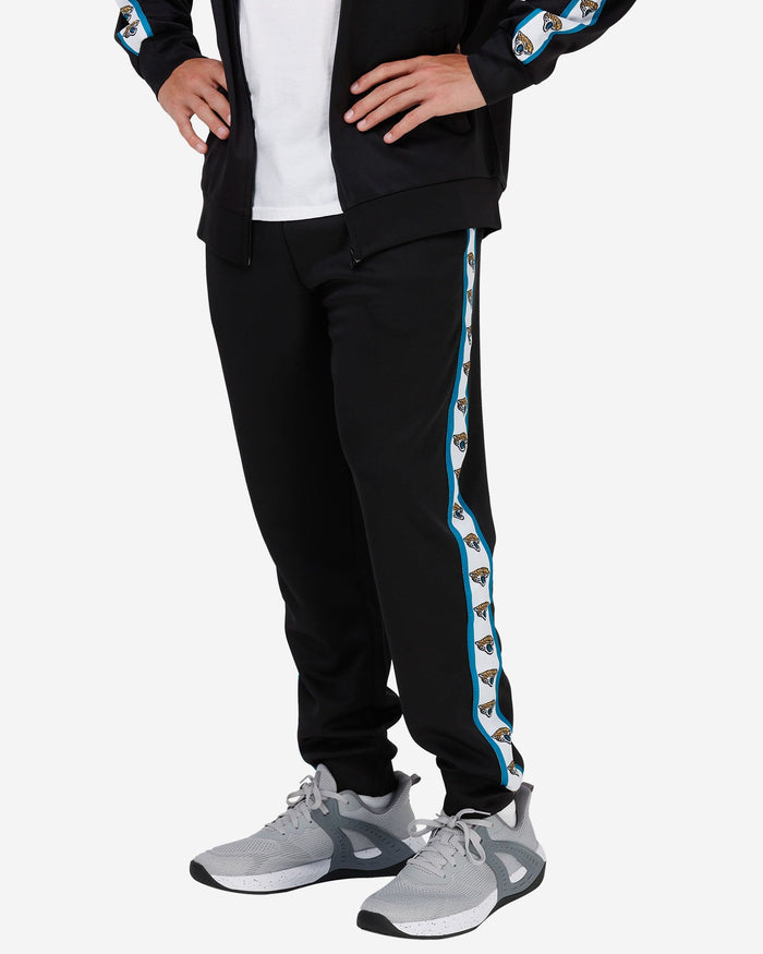 Jacksonville Jaguars Stripe Logo Track Pants FOCO S - FOCO.com