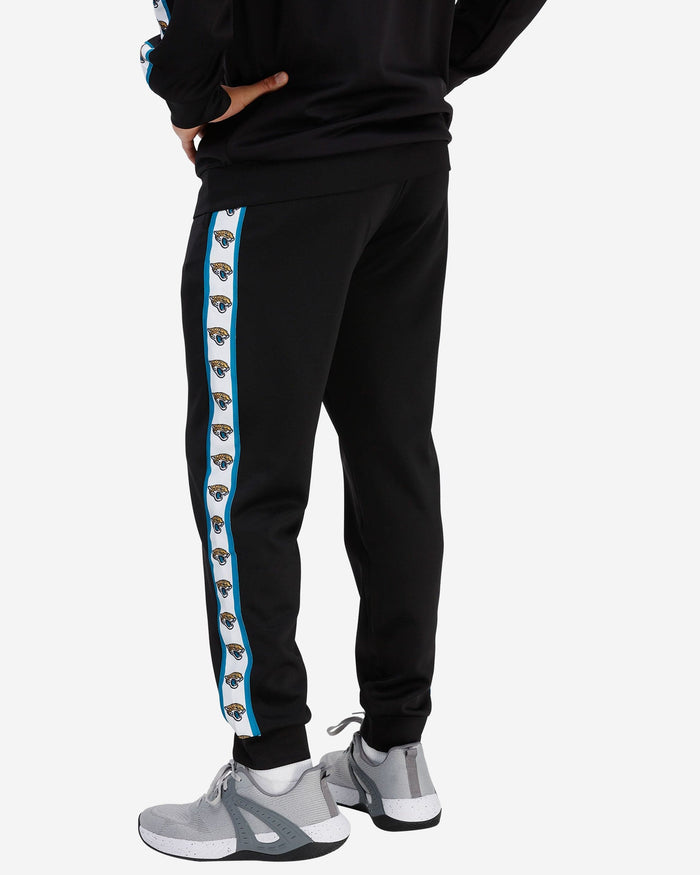 Jacksonville Jaguars Stripe Logo Track Pants FOCO - FOCO.com