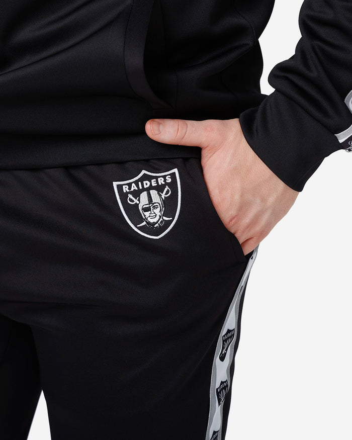 Las Vegas Raiders Stripe Logo Track Pants FOCO - FOCO.com