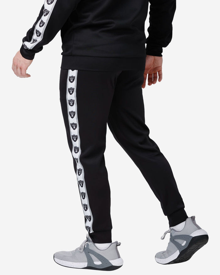 Las Vegas Raiders Stripe Logo Track Pants FOCO - FOCO.com