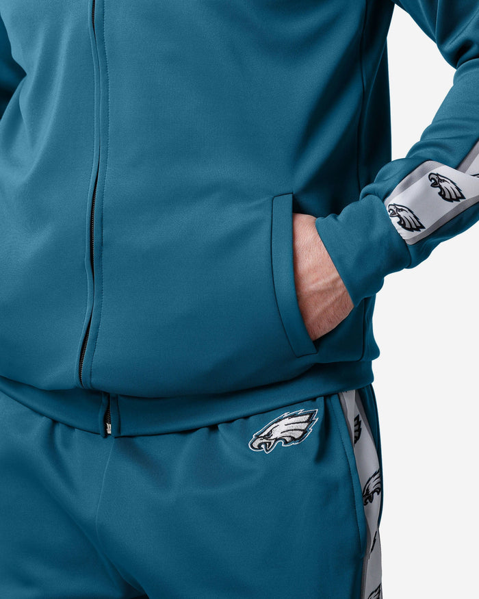 Philadelphia Eagles Stripe Logo Track Jacket FOCO - FOCO.com