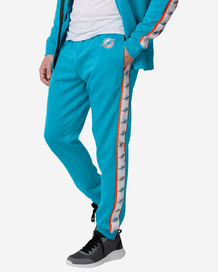 Miami Dolphins Stripe Logo Track Pants FOCO S - FOCO.com