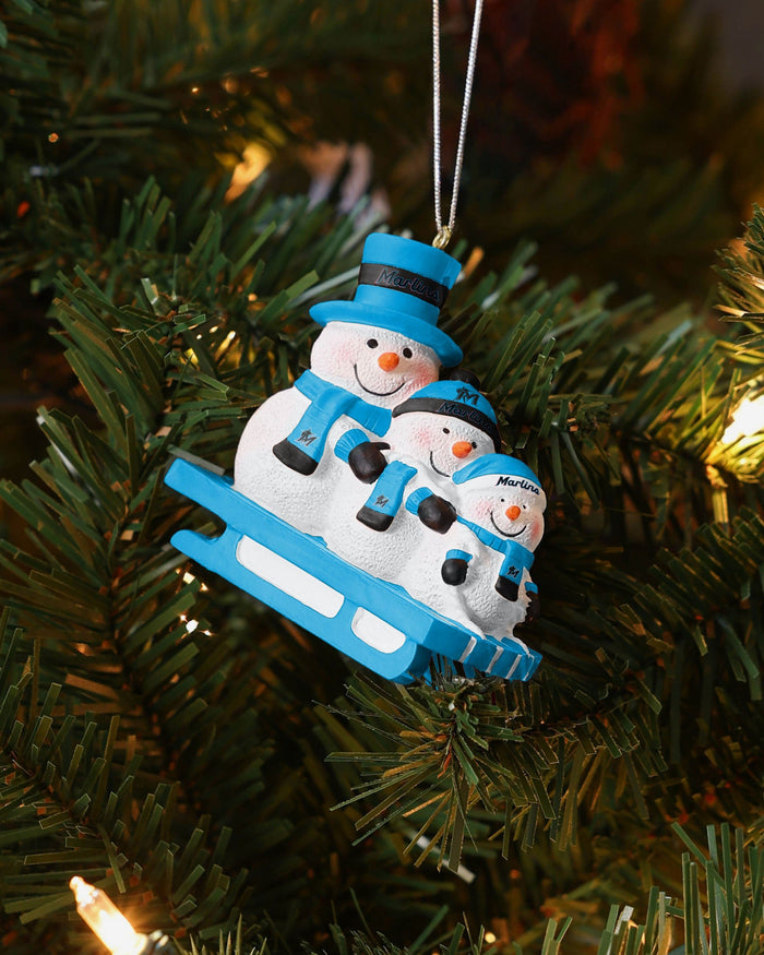 Miami Marlins Sledding Snowmen Ornament FOCO - FOCO.com