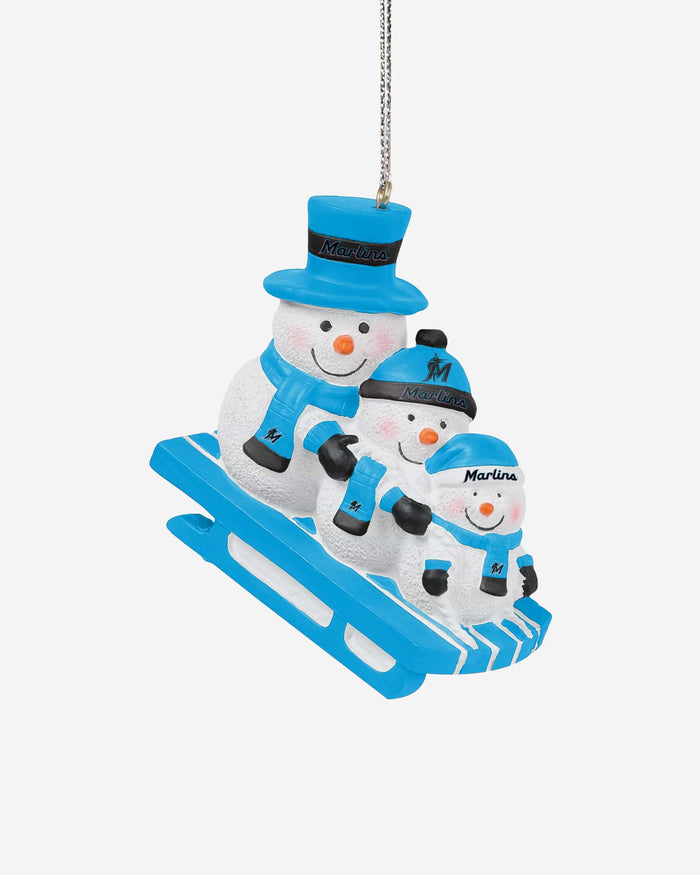 Miami Marlins Sledding Snowmen Ornament FOCO - FOCO.com
