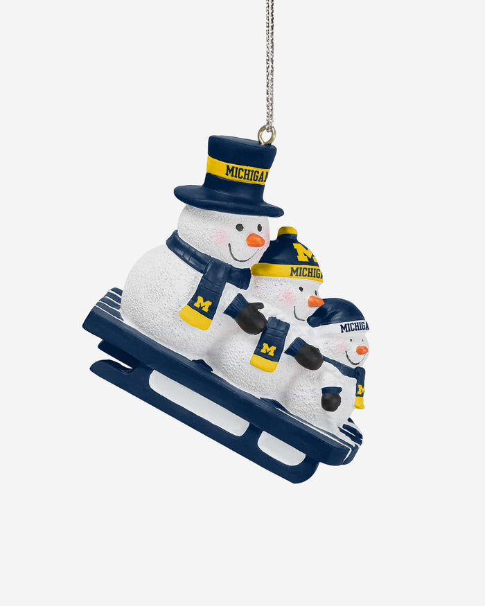 Michigan Wolverines Sledding Snowmen Ornament FOCO - FOCO.com