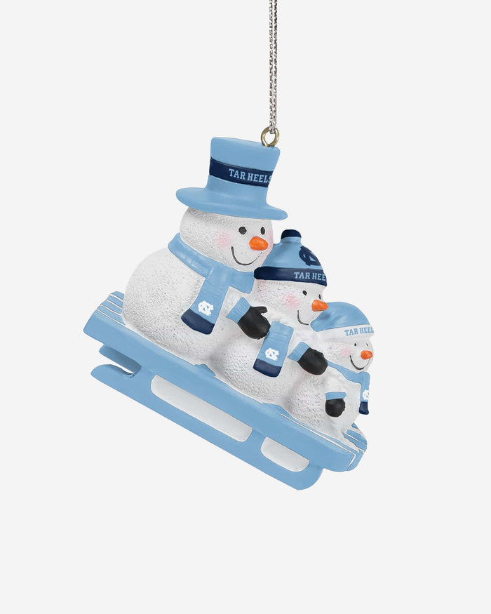 North Carolina Tar Heels Sledding Snowmen Ornament FOCO - FOCO.com