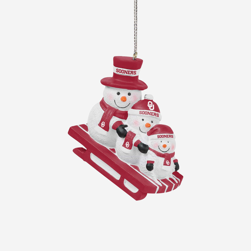 Oklahoma Sooners Sledding Snowmen Ornament FOCO - FOCO.com