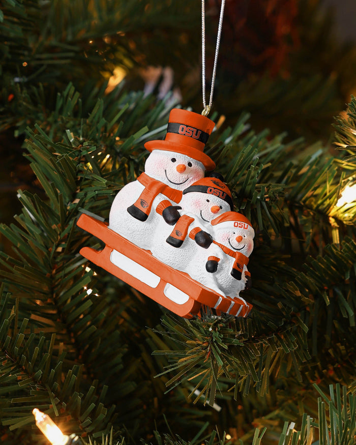 Oregon State Beavers Sledding Snowmen Ornament FOCO - FOCO.com