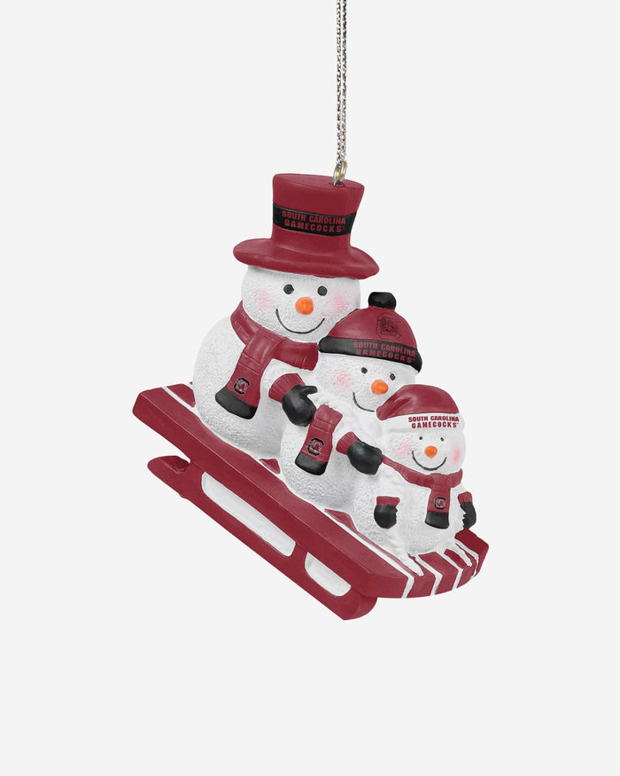 South Carolina Gamecocks Sledding Snowmen Ornament FOCO - FOCO.com