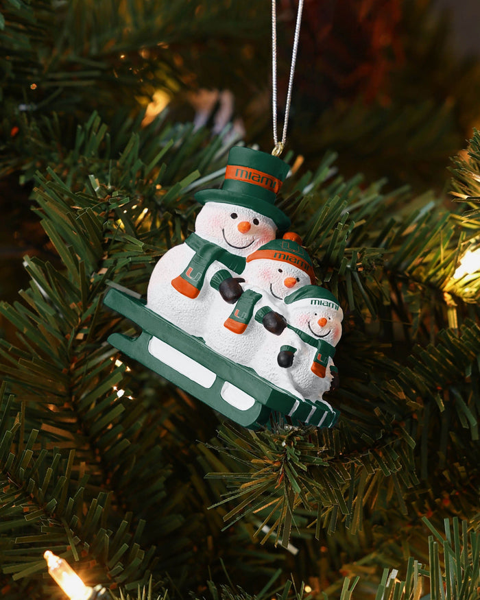 Miami Hurricanes Sledding Snowmen Ornament FOCO - FOCO.com