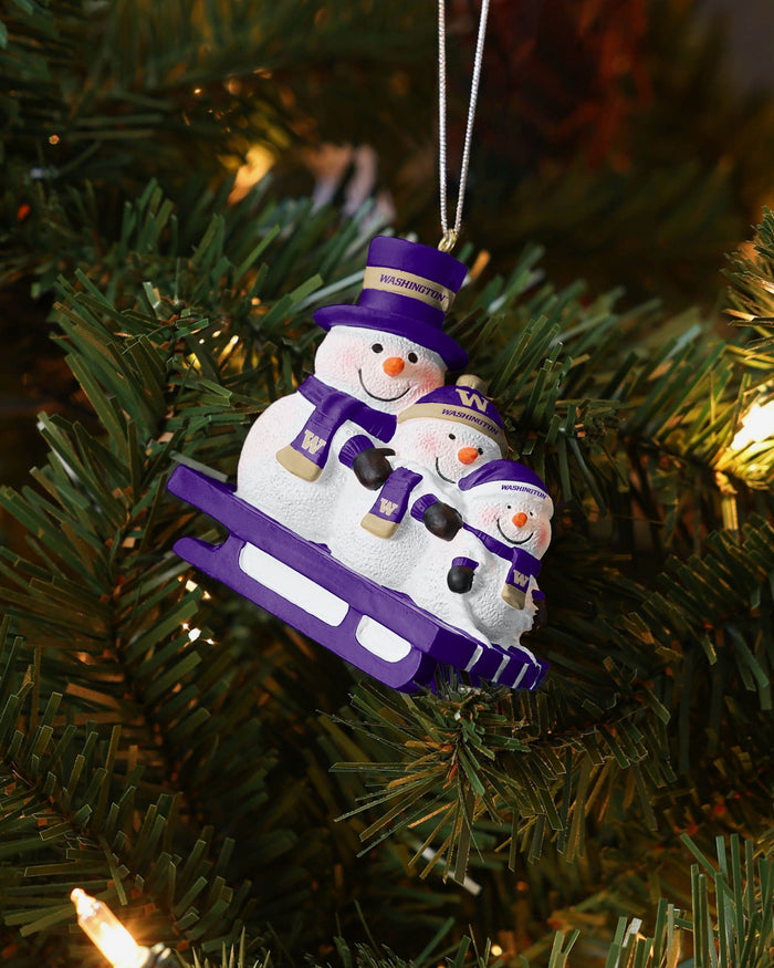 Washington Huskies Sledding Snowmen Ornament FOCO - FOCO.com