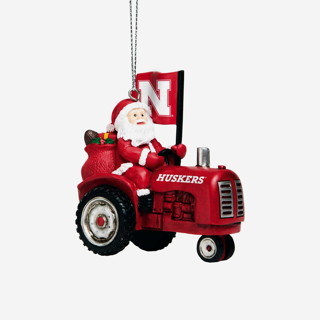 Nebraska Cornhuskers Santa Riding Tractor Ornament FOCO - FOCO.com