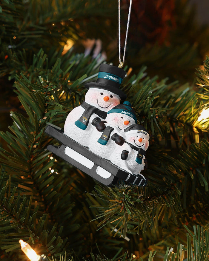 Jacksonville Jaguars Sledding Snowmen Ornament FOCO - FOCO.com