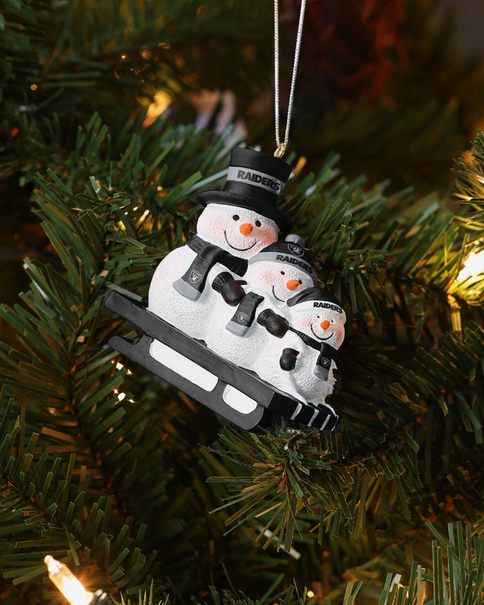 Las Vegas Raiders Sledding Snowmen Ornament FOCO - FOCO.com