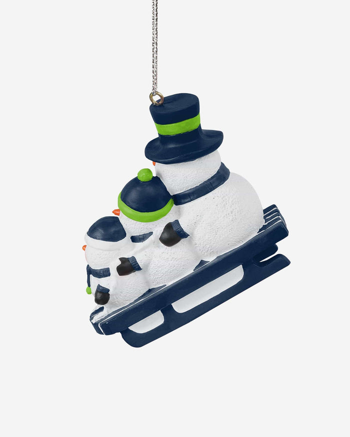 Seattle Seahawks Sledding Snowmen Ornament FOCO - FOCO.com